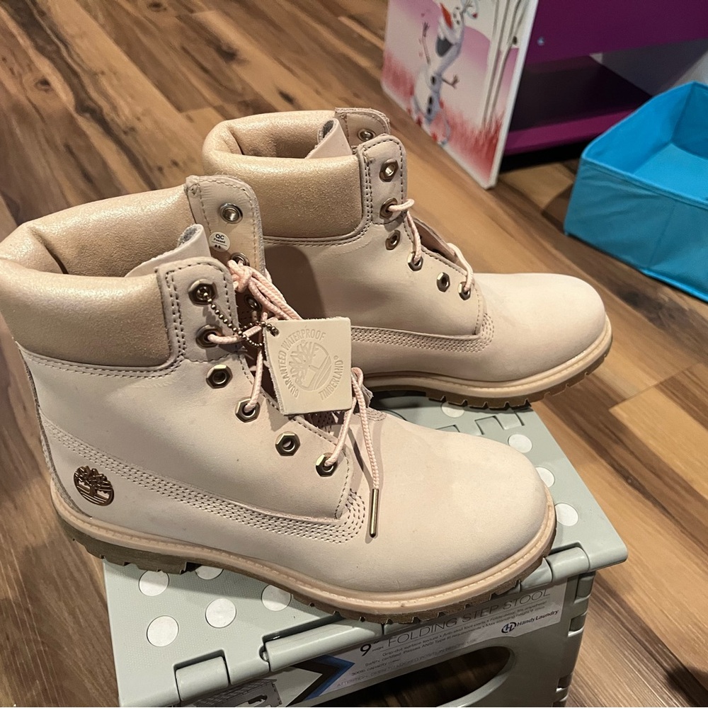 Light dusty pink Tim’s size 8.5
